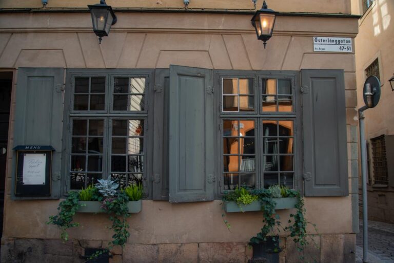 Stockholm-Sweden-Old-Town-ELJ-002 Reflections of Old Town are seen in the windows of Den Gyldene Freden, a restaurant in Gamla Stan, in Stockholm, Sweden. Photo by Eva-Lotta Jansson