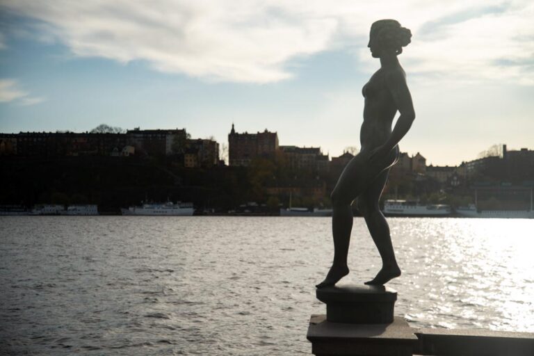 Stockholm-Sweden-Stadshuset-ELJ-004 A statue at City Hall, Stadshuset, is seen against the sky in Stockholm, Sweden. Photo by Eva-Lotta Jansson